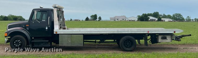 image for item HL9025 1997 International 4700  rollback truck