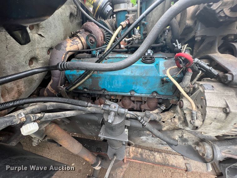 image for item HL9025 1997 International 4700  rollback truck