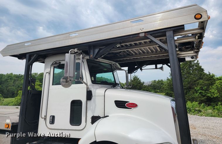 image for item JL9443 2007 Peterbilt 335  rollback truck