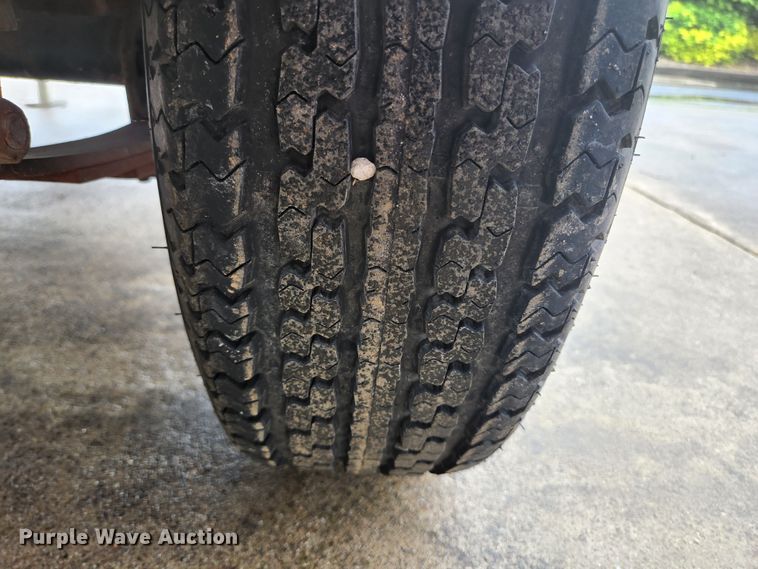 image for item JM9074 2001 Hog Wild Trailer Company  tilt deck utility trailer