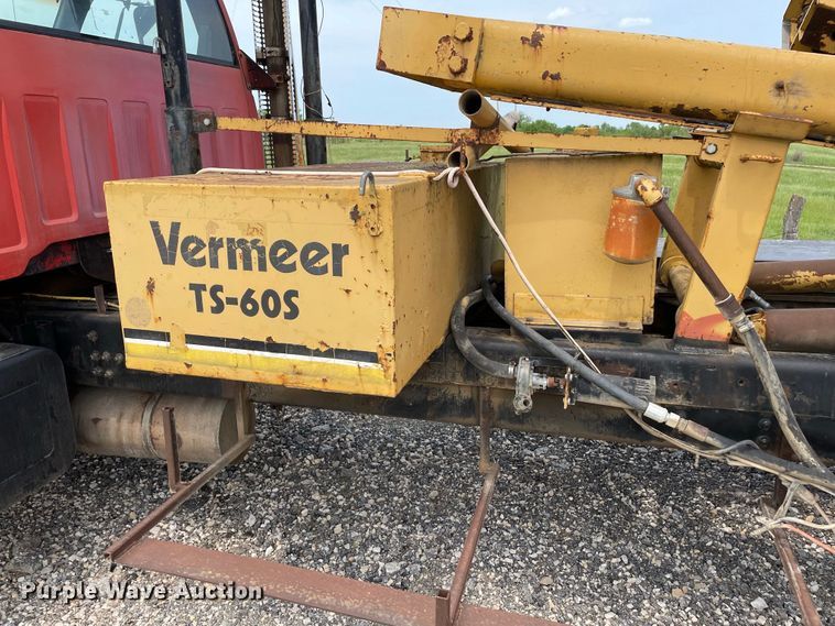 image for item JC9864 1990 GMC C6000  truck with Vermeer tree spade