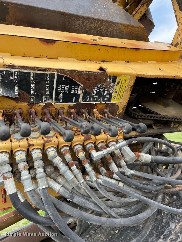 image for item JC9864 1990 GMC C6000  truck with Vermeer tree spade