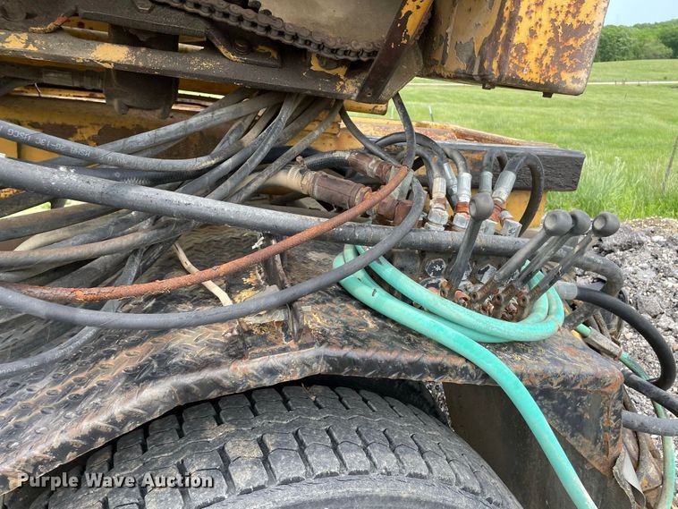 image for item JC9864 1990 GMC C6000  truck with Vermeer tree spade