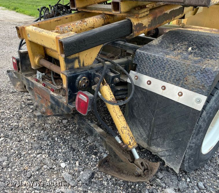 image for item JC9864 1990 GMC C6000  truck with Vermeer tree spade