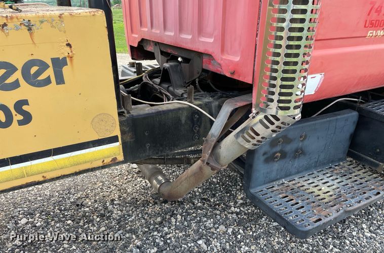 image for item JC9864 1990 GMC C6000  truck with Vermeer tree spade