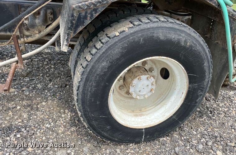 image for item JC9864 1990 GMC C6000  truck with Vermeer tree spade