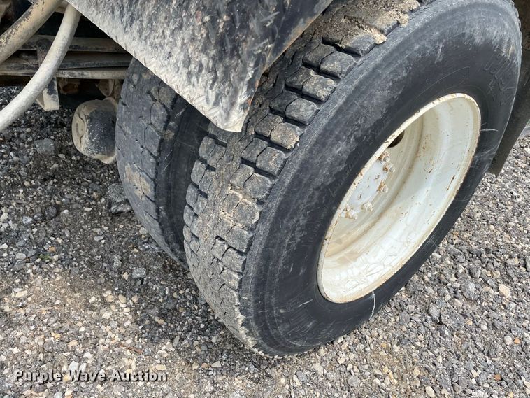 image for item JC9864 1990 GMC C6000  truck with Vermeer tree spade