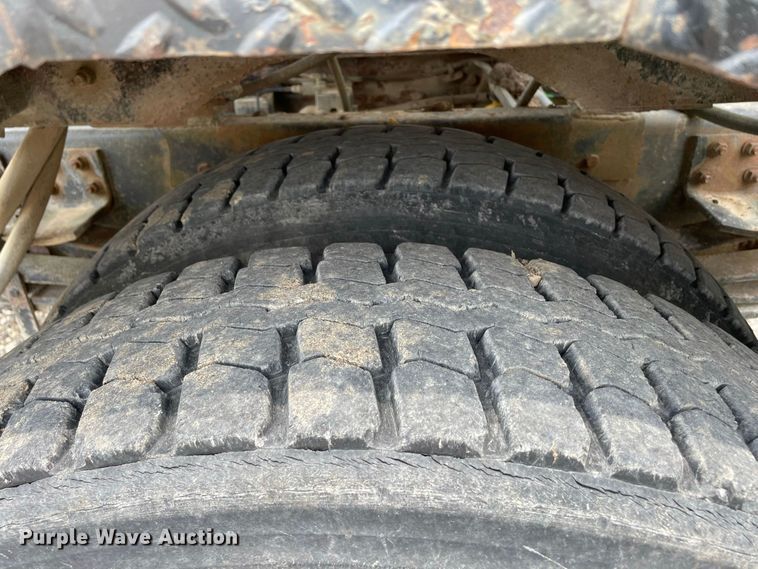 image for item JC9864 1990 GMC C6000  truck with Vermeer tree spade