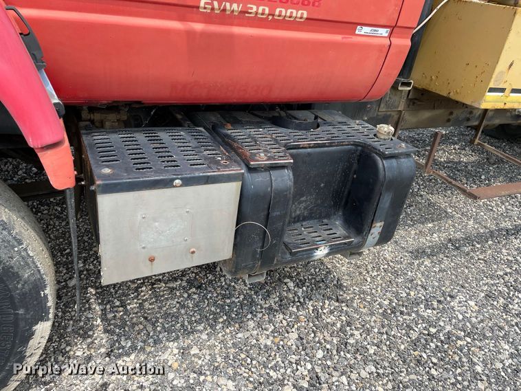 image for item JC9864 1990 GMC C6000  truck with Vermeer tree spade