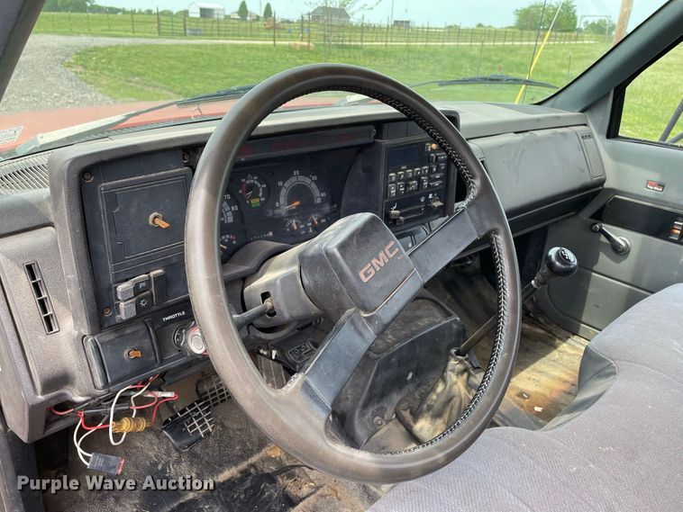 image for item JC9864 1990 GMC C6000  truck with Vermeer tree spade