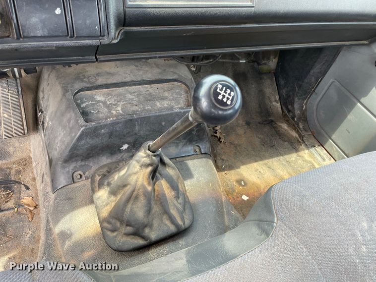 image for item JC9864 1990 GMC C6000  truck with Vermeer tree spade