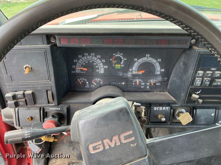 image for item JC9864 1990 GMC C6000  truck with Vermeer tree spade