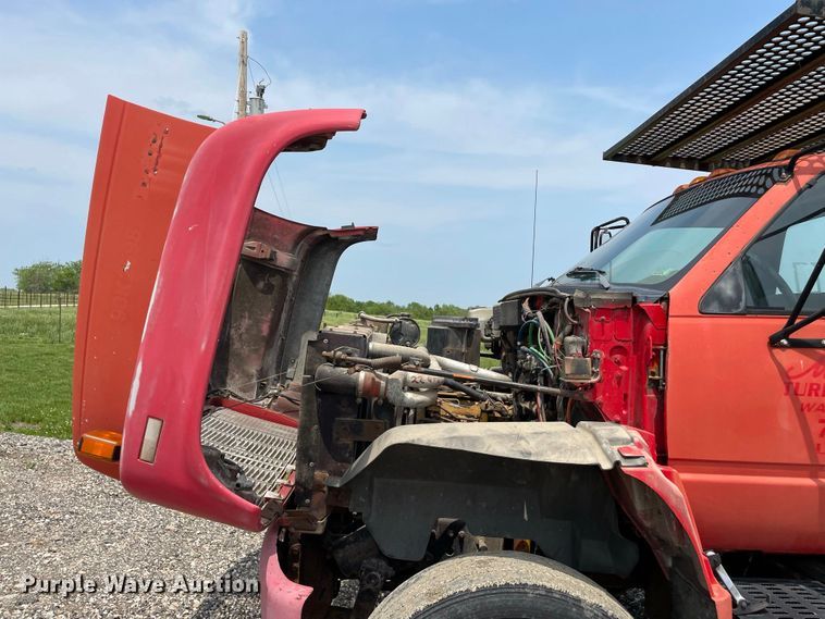 image for item JC9864 1990 GMC C6000  truck with Vermeer tree spade