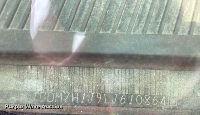 image for item JC9864 1990 GMC C6000  truck with Vermeer tree spade