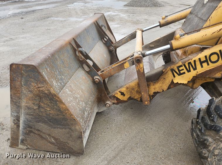image for item JM9073 1996 New Holland 555E  backhoe