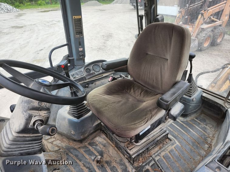 image for item JM9073 1996 New Holland 555E  backhoe