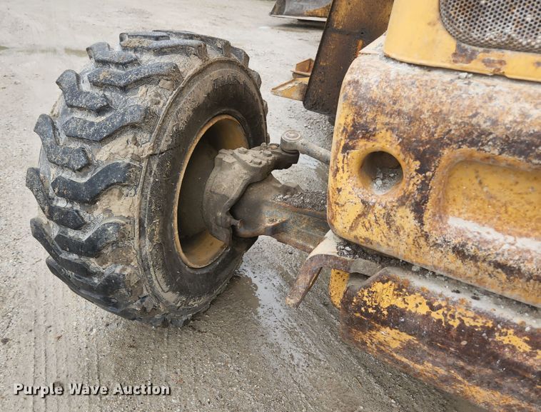 image for item JM9073 1996 New Holland 555E  backhoe