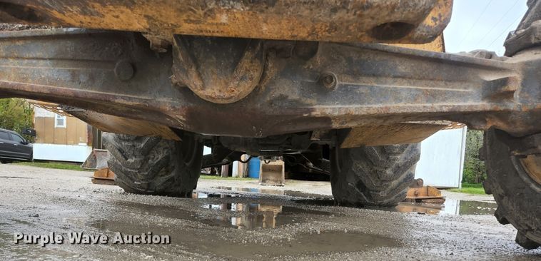 image for item JM9073 1996 New Holland 555E  backhoe