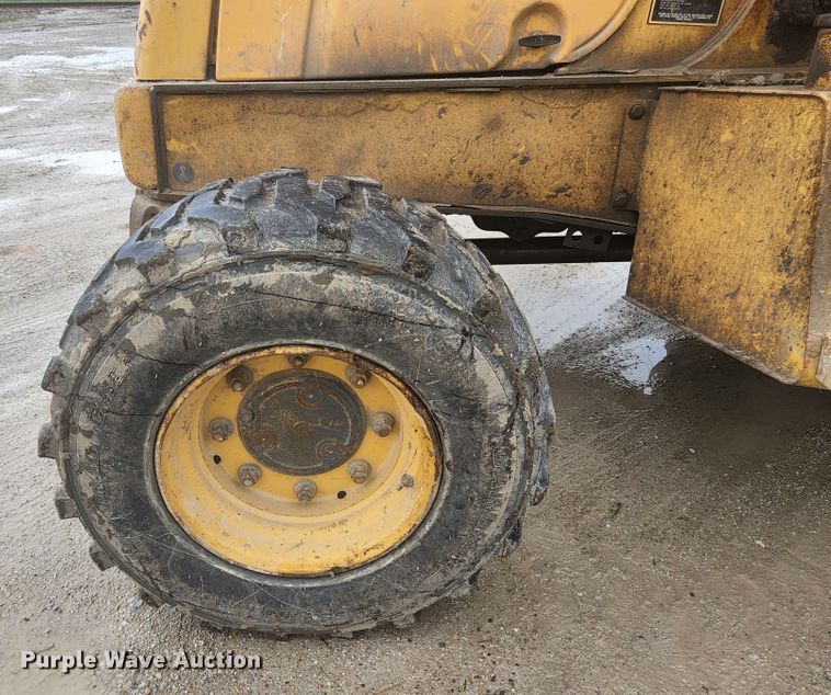 image for item JM9073 1996 New Holland 555E  backhoe