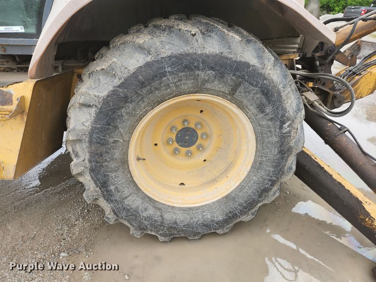 image for item JM9073 1996 New Holland 555E  backhoe