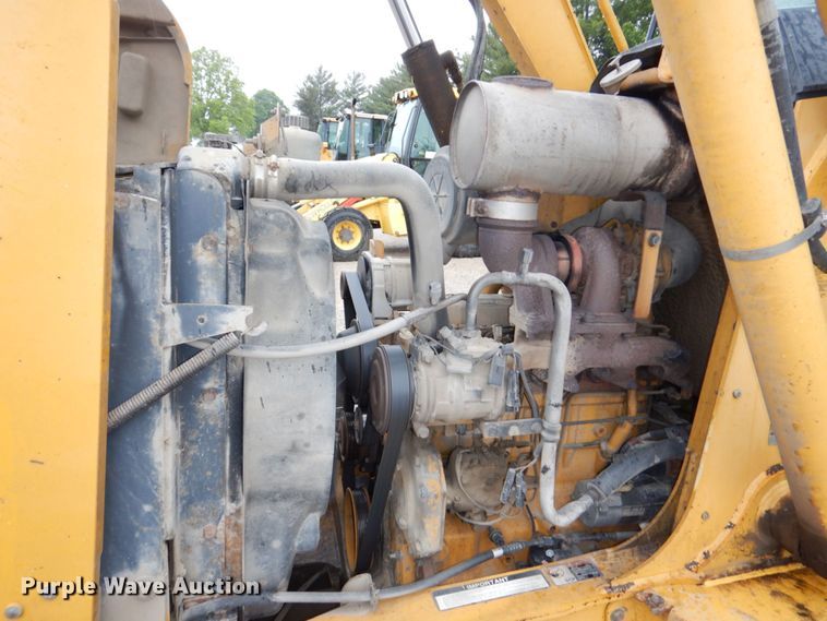 image for item DN7443 2001 John Deere 310SG  backhoe