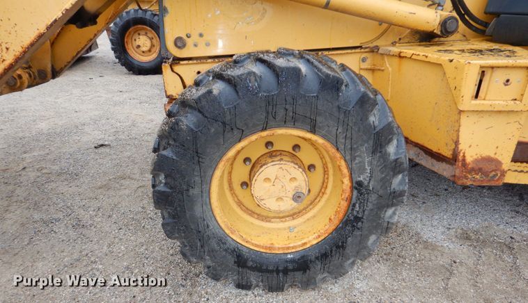 image for item DN7443 2001 John Deere 310SG  backhoe