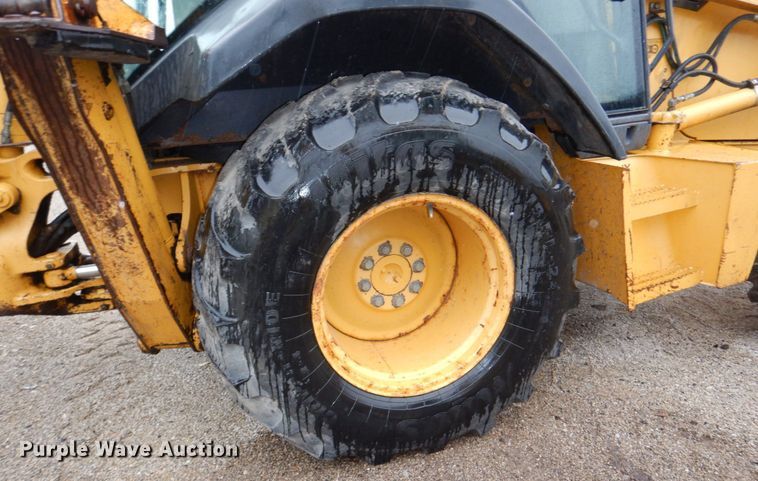 image for item DN7443 2001 John Deere 310SG  backhoe