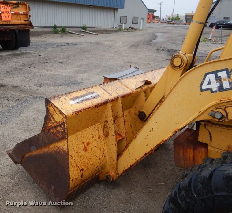 image for item DN7444 2003 John Deere 410G  backhoe