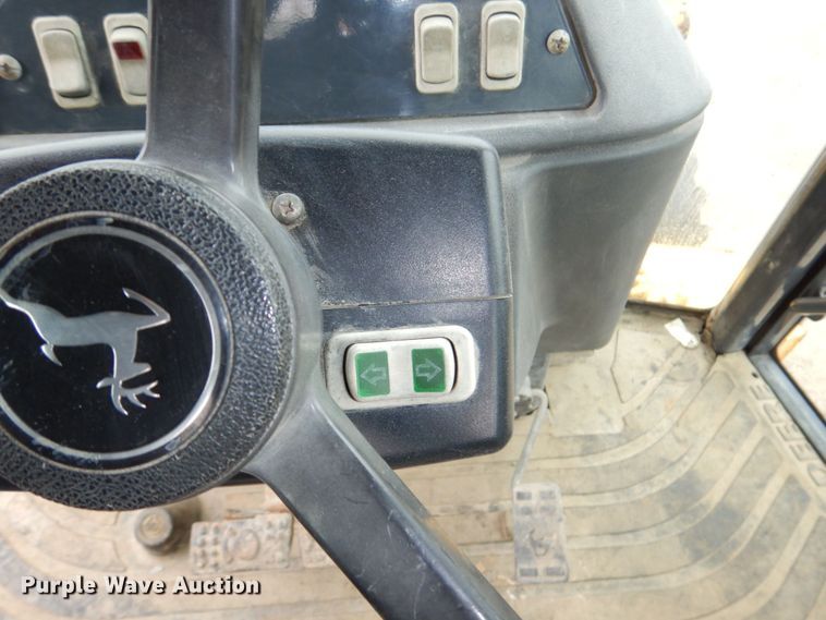 image for item DN7444 2003 John Deere 410G  backhoe