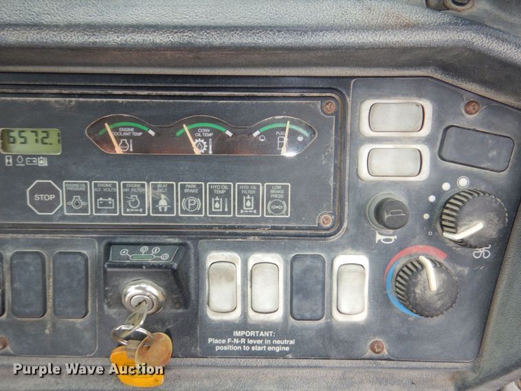 image for item DN7444 2003 John Deere 410G  backhoe