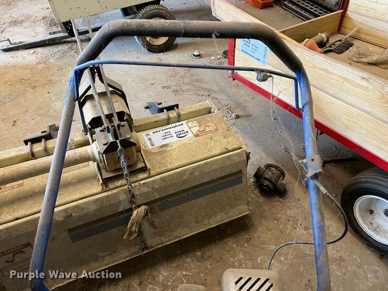 image for item DR1538 Blue Bird C18  dethatcher