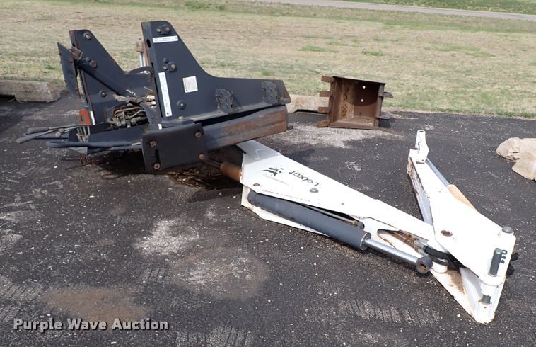 image for item KR9703 Bobcat 811  skid steer backhoe