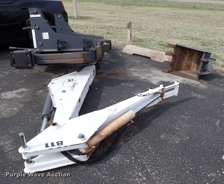 image for item KR9703 Bobcat 811  skid steer backhoe