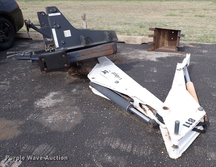 image for item KR9703 Bobcat 811  skid steer backhoe