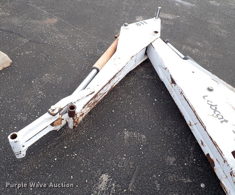 image for item KR9703 Bobcat 811  skid steer backhoe