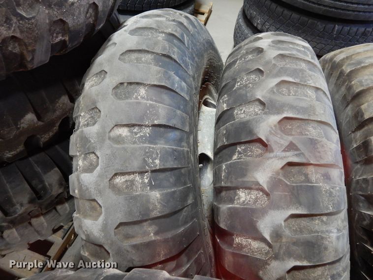 image for item LT9819 (9) 11.00-20 tires and wheels