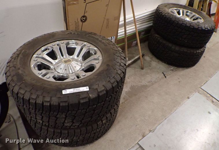 image for item MF9282 (4) Nitto Terra grappler tires and rims