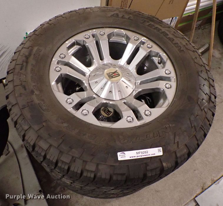 image for item MF9282 (4) Nitto Terra grappler tires and rims