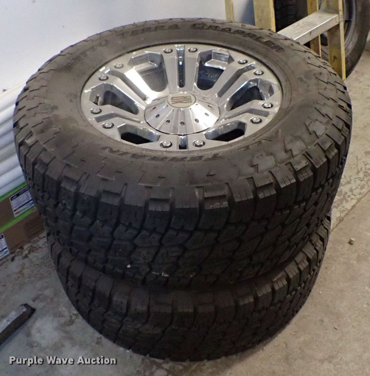 image for item MF9282 (4) Nitto Terra grappler tires and rims