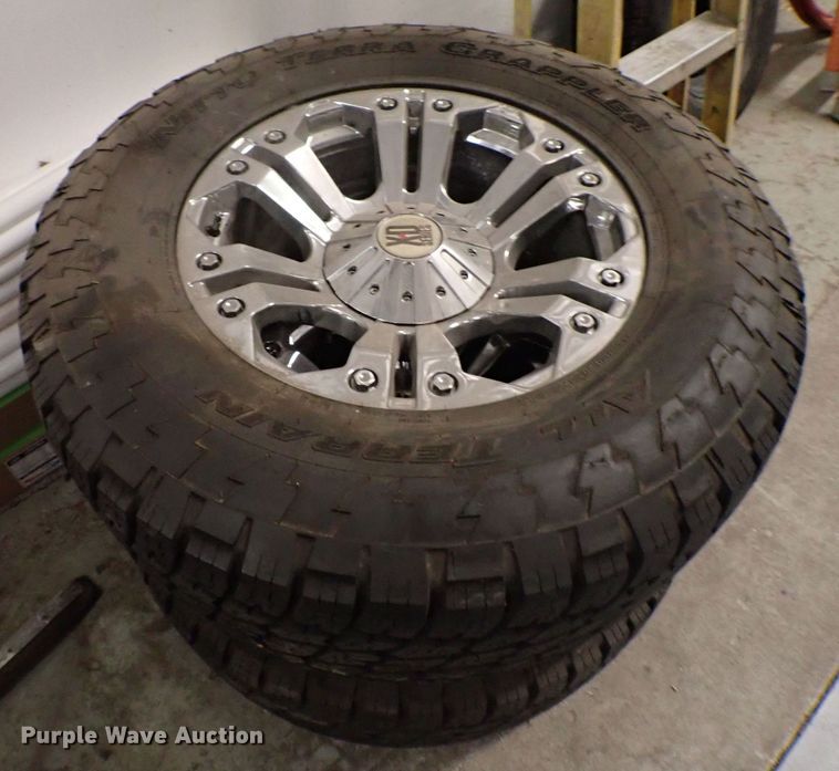 image for item MF9282 (4) Nitto Terra grappler tires and rims