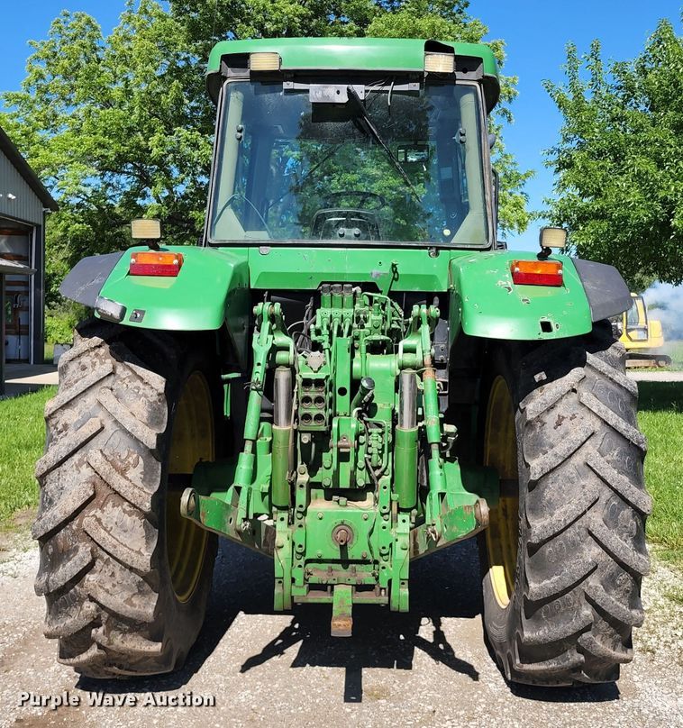image for item DL6520 1998 John Deere 7710  MFWD tractor