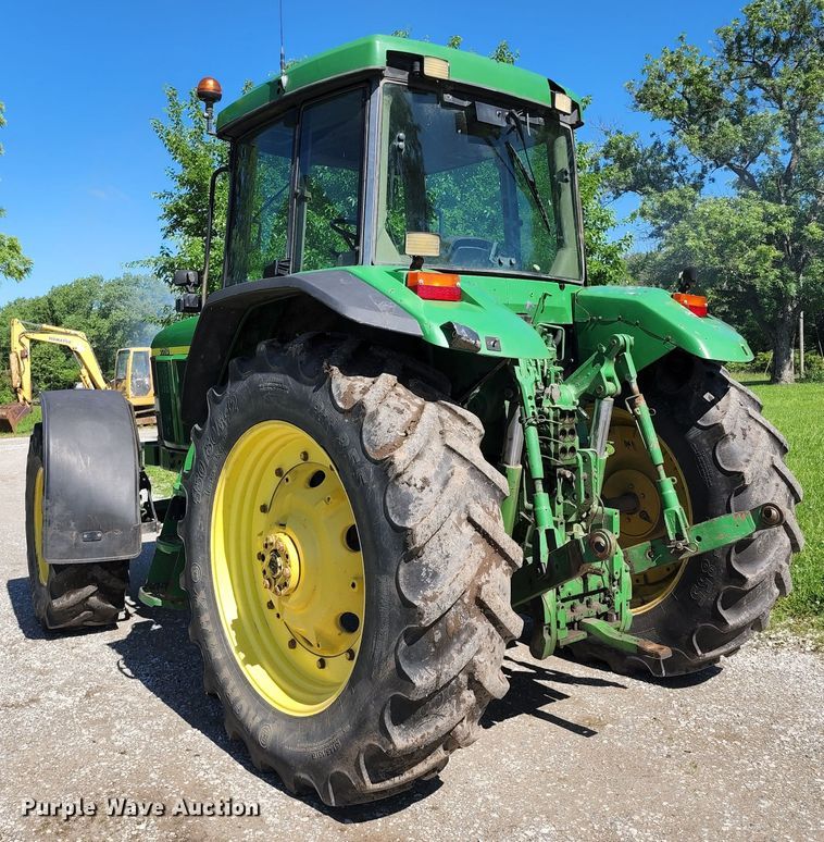image for item DL6520 1998 John Deere 7710  MFWD tractor
