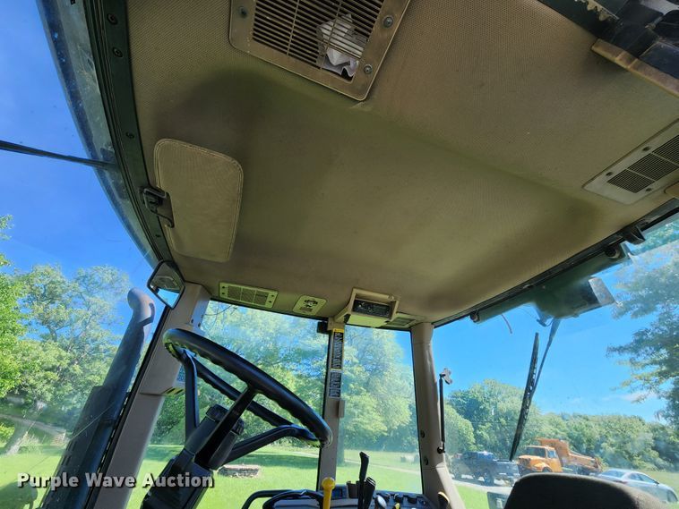 image for item DL6520 1998 John Deere 7710  MFWD tractor