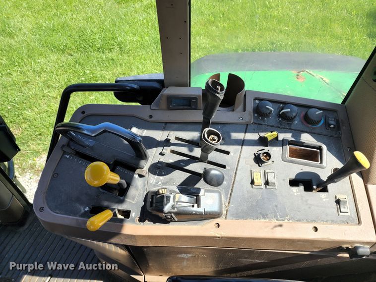 image for item DL6520 1998 John Deere 7710  MFWD tractor