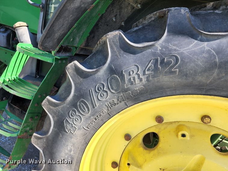 image for item DL6520 1998 John Deere 7710  MFWD tractor