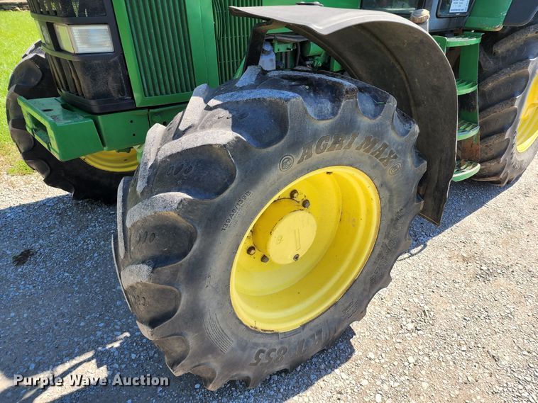 image for item DL6520 1998 John Deere 7710  MFWD tractor