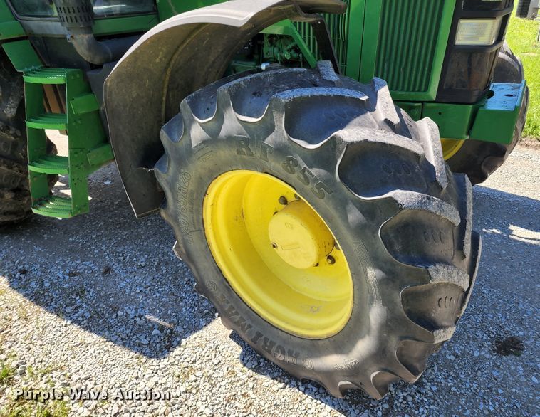 image for item DL6520 1998 John Deere 7710  MFWD tractor