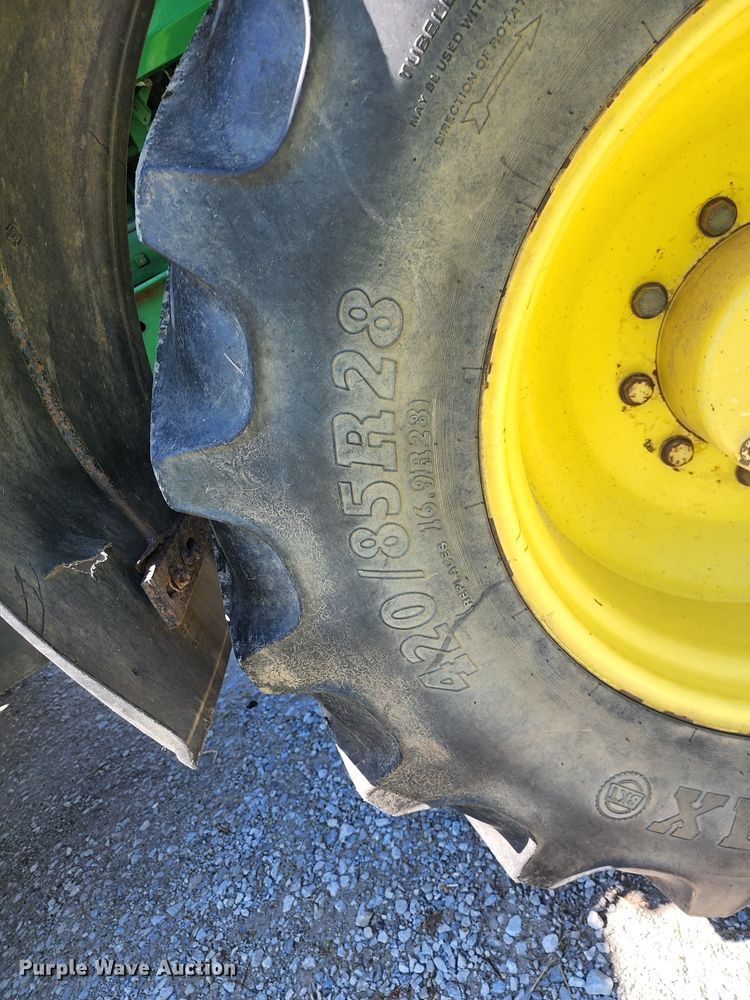 image for item DL6520 1998 John Deere 7710  MFWD tractor