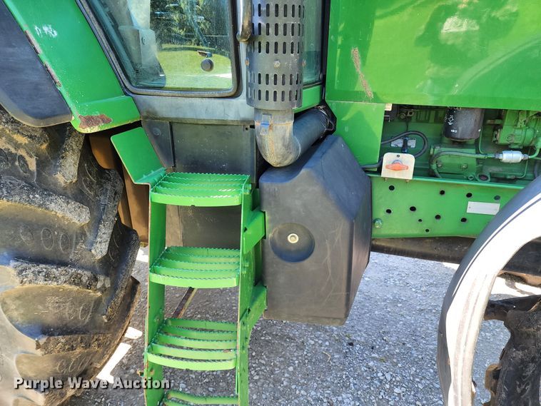image for item DL6520 1998 John Deere 7710  MFWD tractor