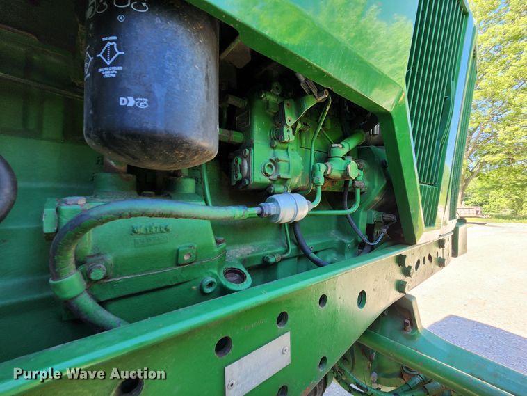 image for item DL6520 1998 John Deere 7710  MFWD tractor